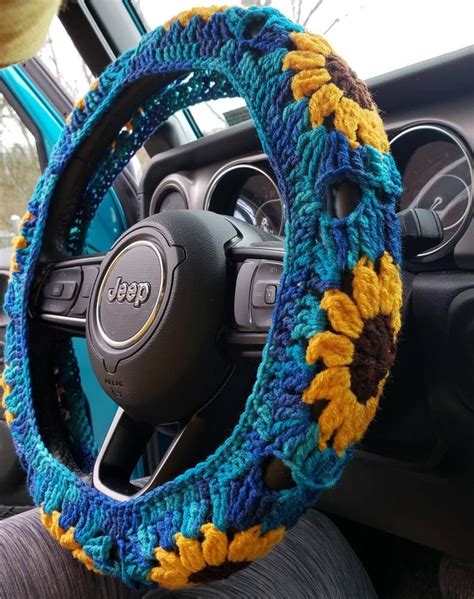 Fit the top of the <b>cover</b> over the top of the <b>wheel</b>. . How to crochet steering wheel cover